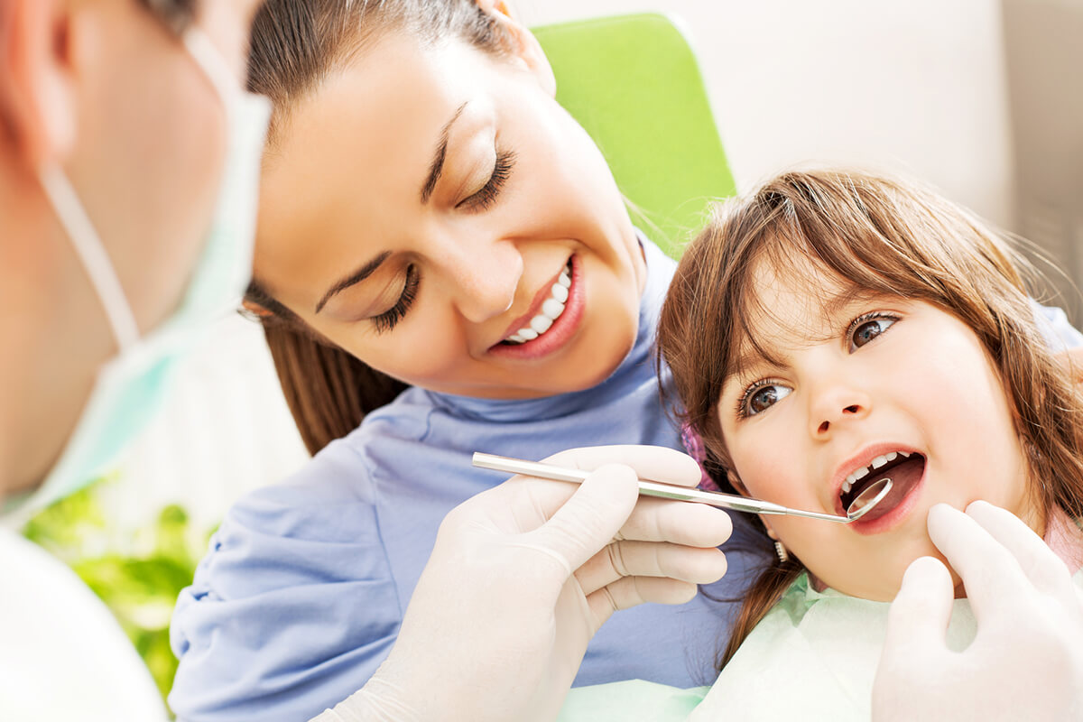 child getting teeth cleaned